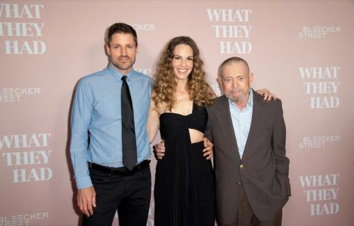 With husband, Philip Schneider and father, Stephen Swank at the Premiere of What They HadPhoto Credit: Earl Gibson III/Getty Images